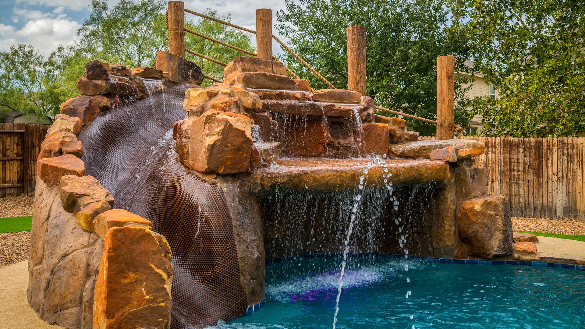 swimming-pool-rock-water-feature-01 Swimming Pool Rock Water Slide Feature 01