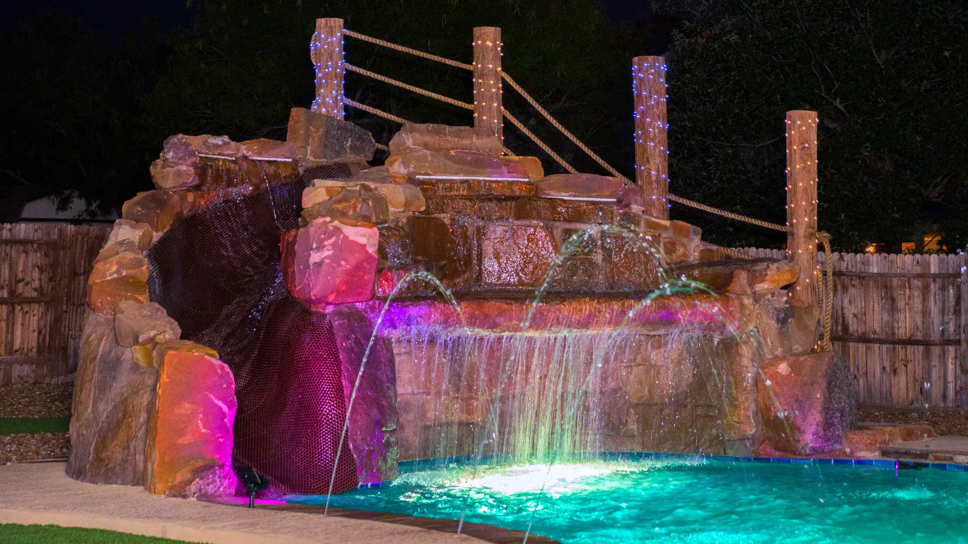 swimming-pool-rock-water-feature-03 Swimming Pool Rock Water Slide Feature 03